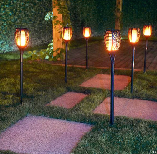Antorcha de Jardín con Energía Solar" oversættes til dansk som "Solcelledrevet Havefakkel